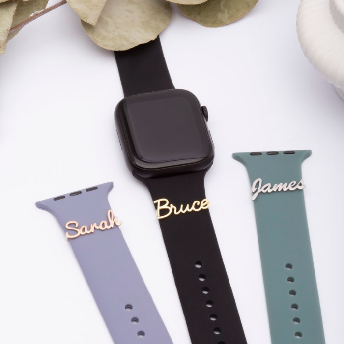"three silver sterling silver apple watch band with a polished finish and a butterfly closure. It has a sleek and modern design that seamlessly pairs with the apple watch, perfect for any occasion, formal or casual."