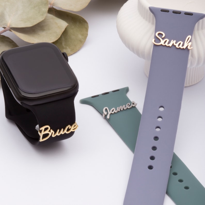 "A silver sterling silver apple watch band with a polished finish and a butterfly closure. It has a sleek and modern design that seamlessly pairs with the apple watch, perfect for any occasion, formal or casual."