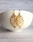 gold plated leaf shaped earrings which are made of 92.5 sterling silver by chokha india
