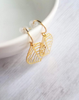 gold plated leaf shaped earrings which are made of 92.5 sterling silver by chokha india top view