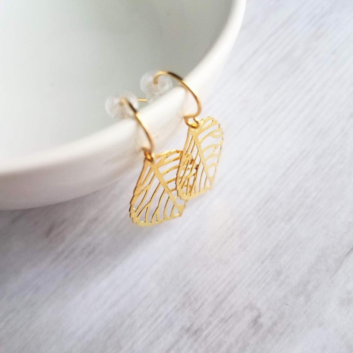 gold plated leaf shaped earrings which are made of 92.5 sterling silver by chokha india top view