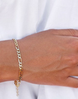 minimalism inspired figaro chain bracelet  which is gold plated 
