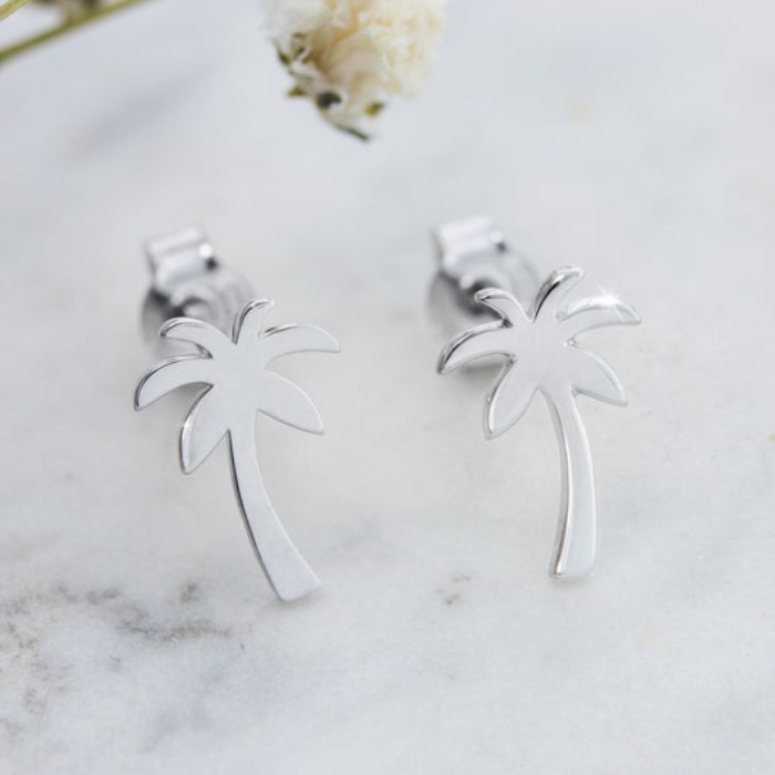 palm tree earrings by chokha india in silver finish