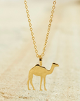 camel pendant by chokha india which is gold plated and is highly polished for longevity 