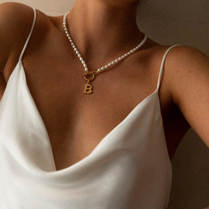 "Model wearing a stunning freshwater pearl necklace""Model wearing a stunning freshwater pearl necklace"