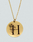 92.5  Sterling silver Pendant  which is Gold plated with Initial &  Birthflower engraved on it by CHOKHA INDIA 