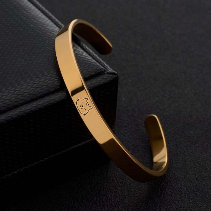 sterling silver, gold plated cat face engraved bracelet by chokha india